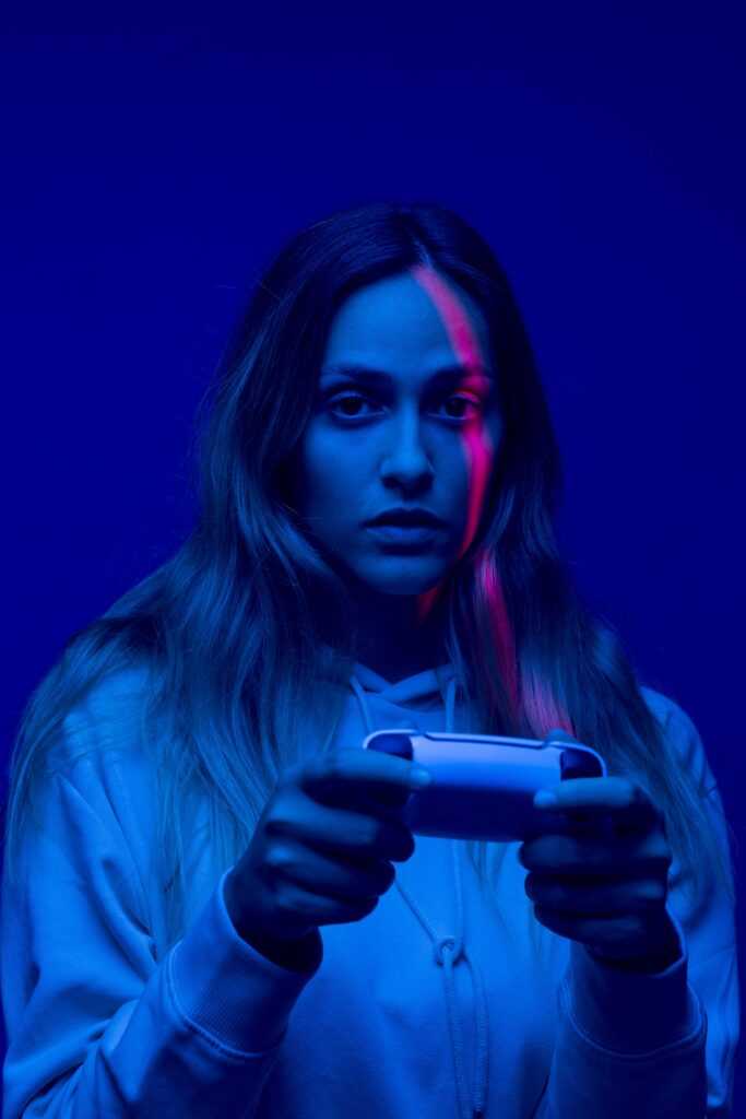 medium shot woman with controller